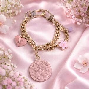 Louis Vuitton charms on an unbranded Gold Bracelet